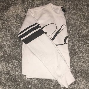 Cropped white "love" long sleeve